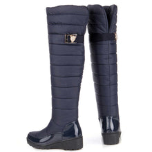 Long quilted flat boot