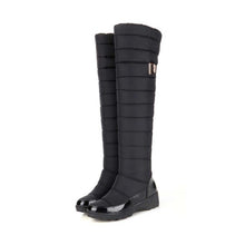 Long quilted flat boot