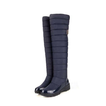 Long quilted flat boot